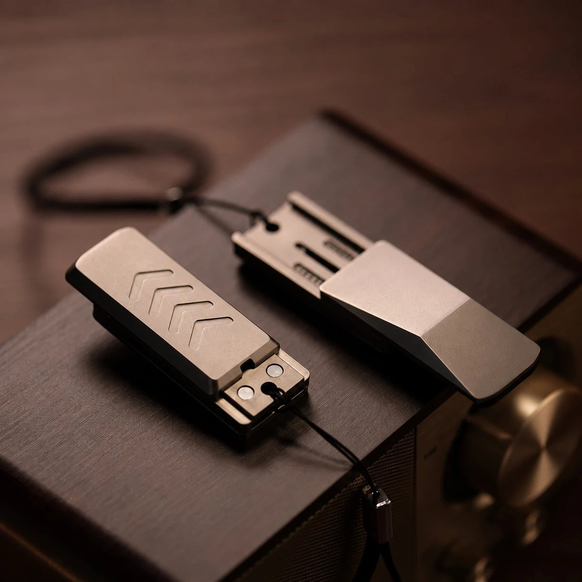 THE CYBER fidget slider open on a black display surface
