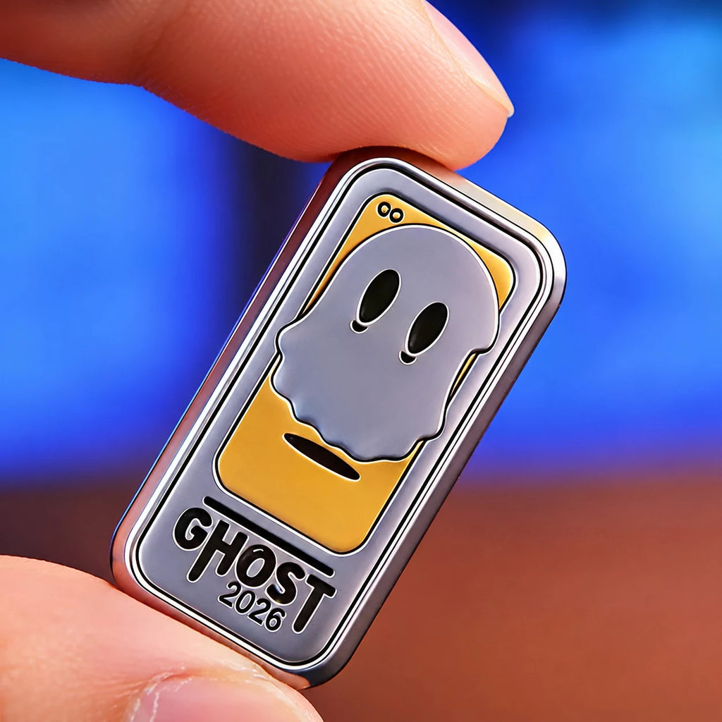 THE GHOST fidget slider held in the palm