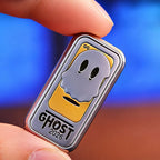 THE GHOST fidget slider held in the palm