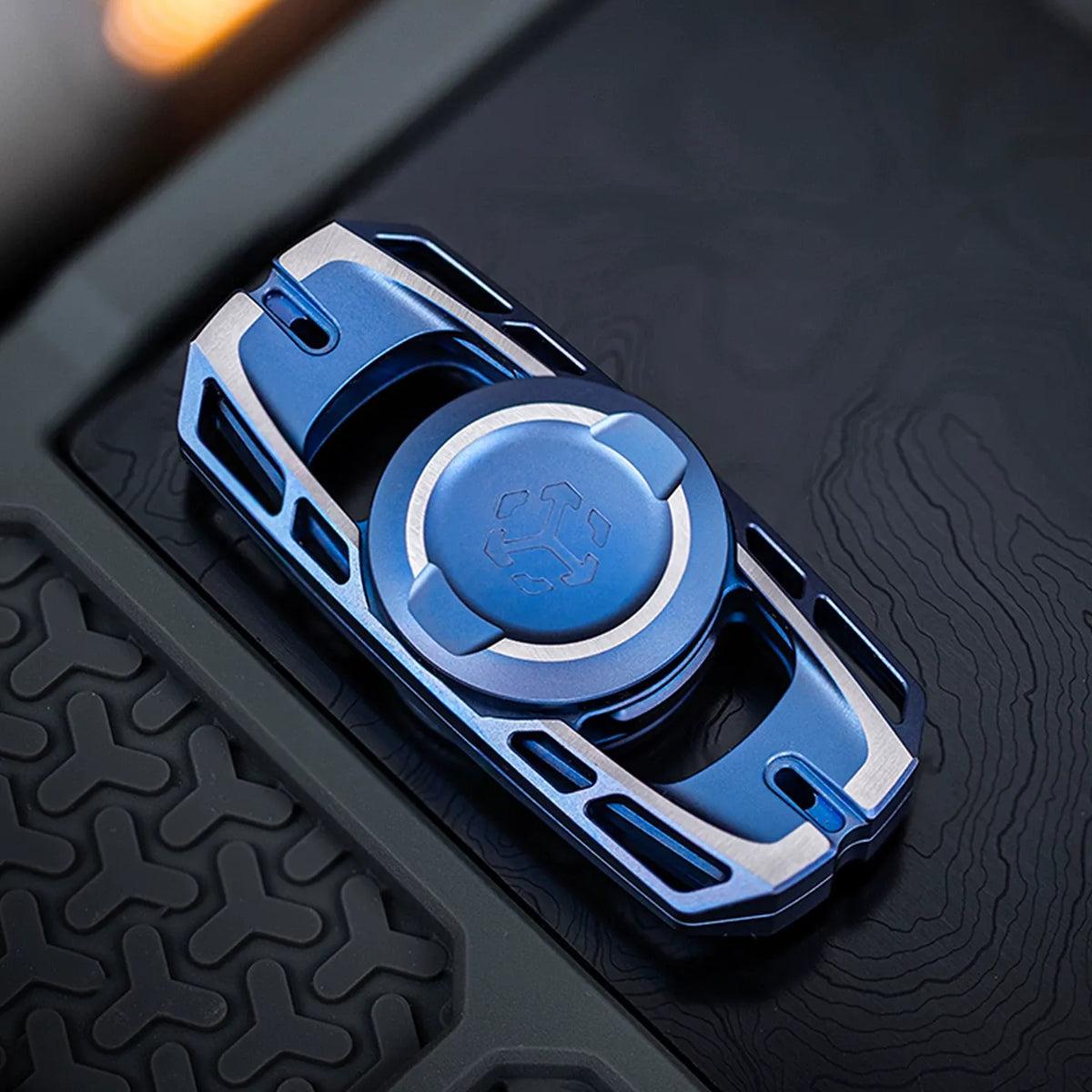ToneSpin tuning fork fidget spinner — blue anodised titanium, product view